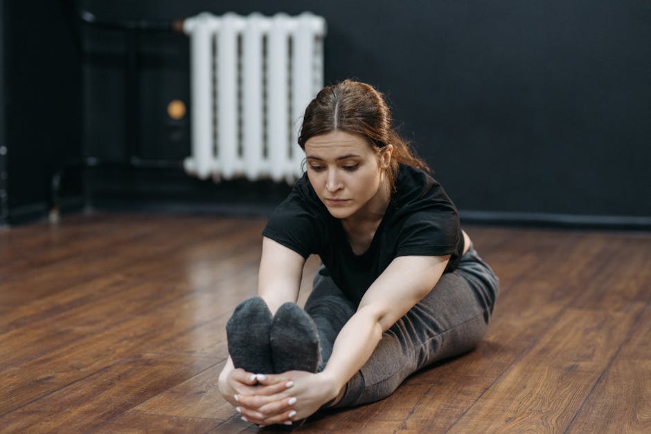 Focused woman practicing a seated yoga twist in a beautifully lit space
